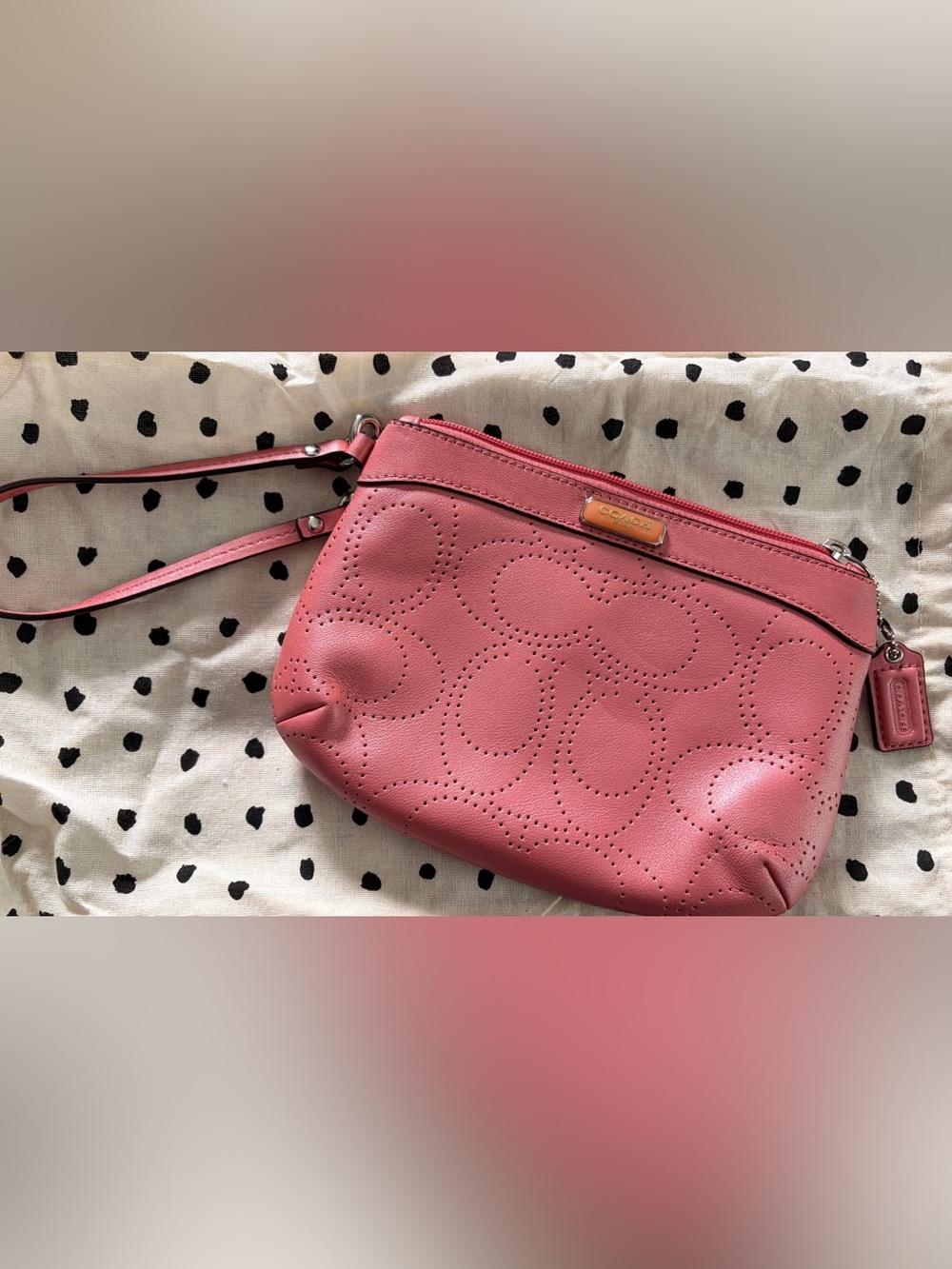 COACH Rose Pink Perforated Leather Wristlet